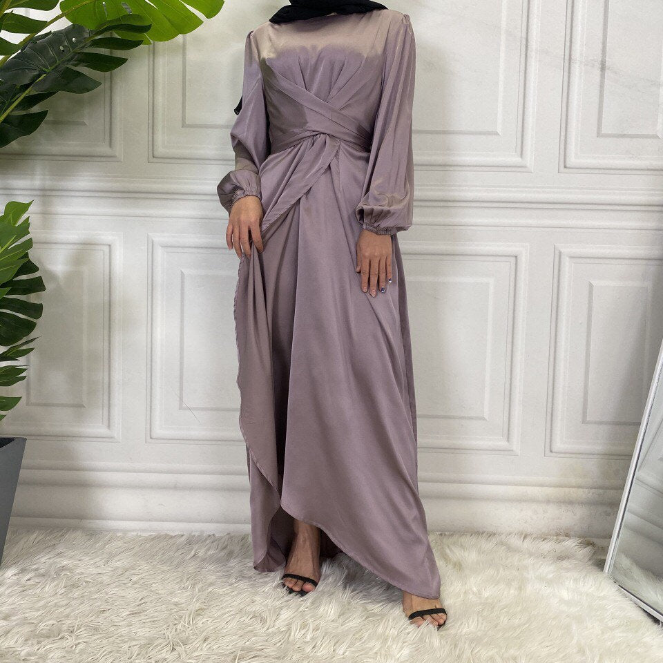 Long purple dress on a mannequin satin hijab dress
