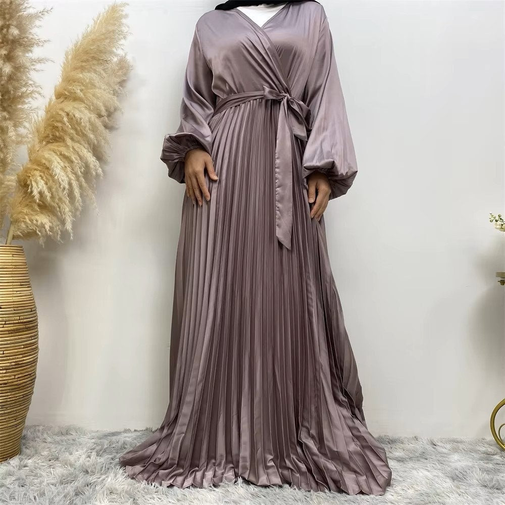 Pleated satin dress with belt