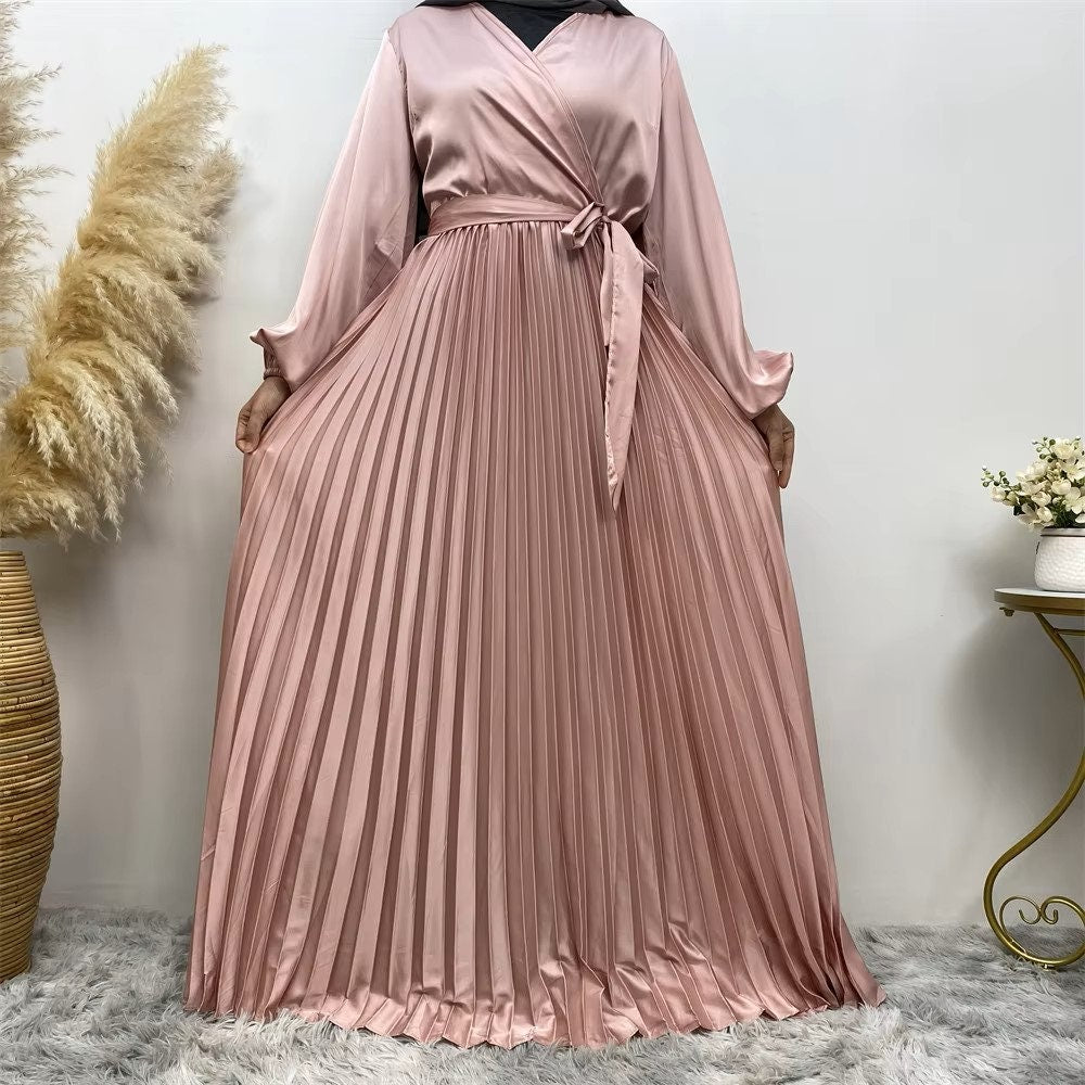 Pleated satin dress with belt