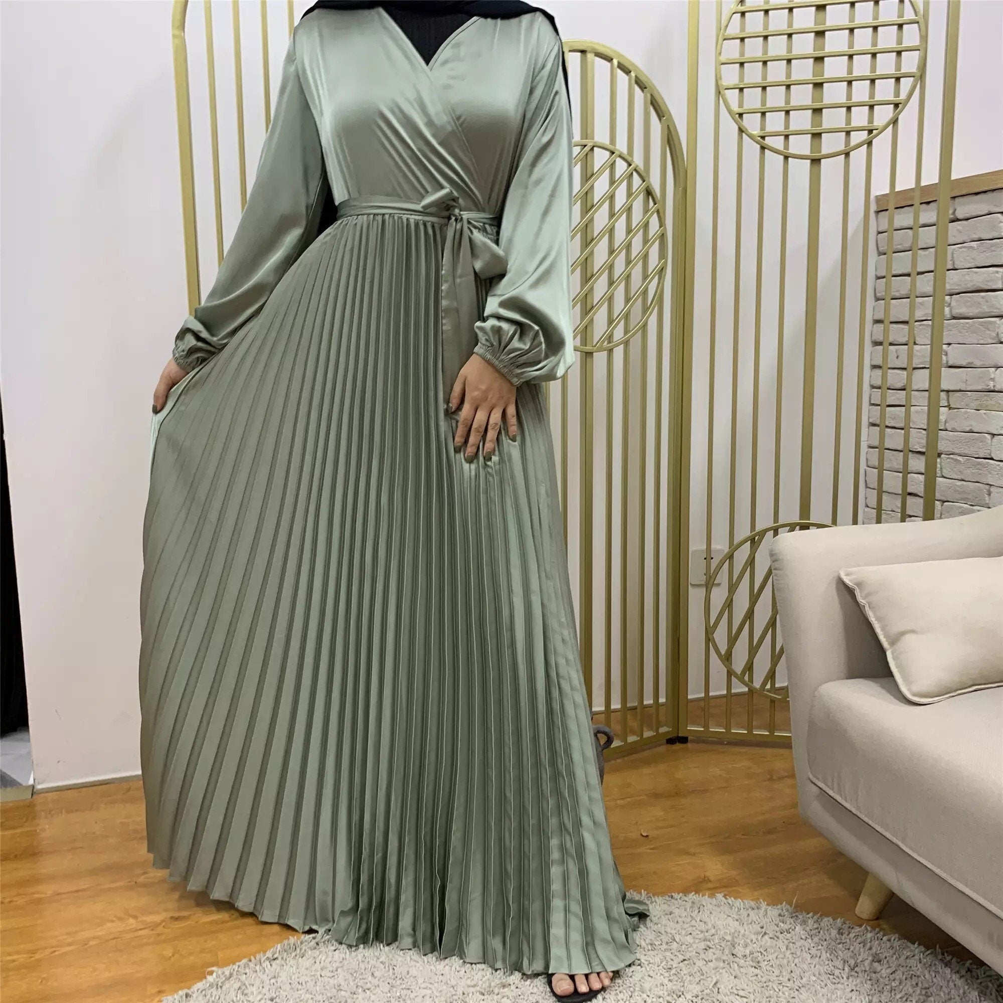 Pleated satin dress with belt