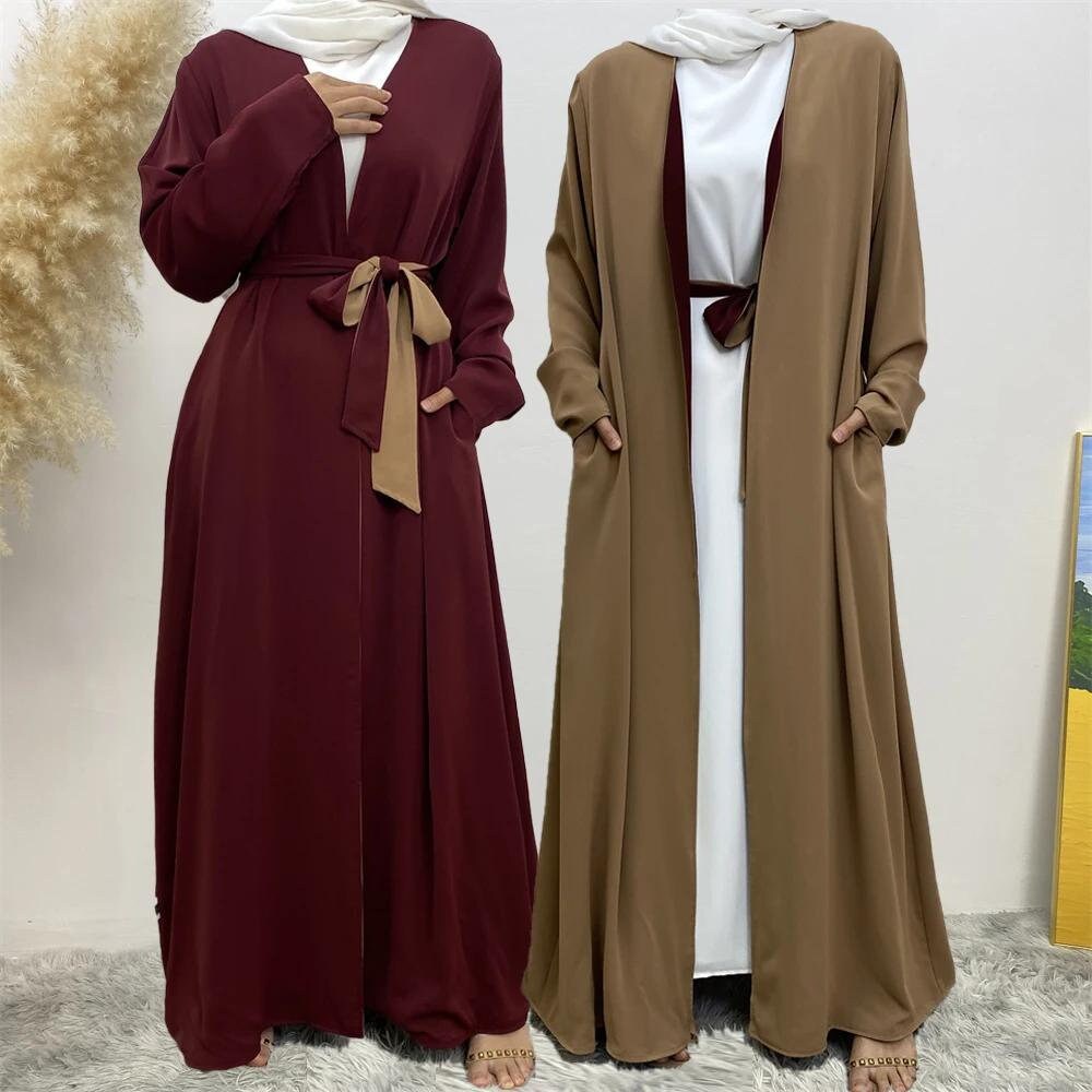 Two long dresses, one maroon and one brown, on a neutral background.