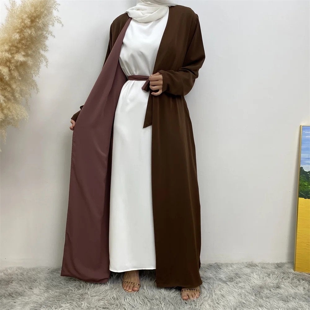long dresses, one maroon and one brown, on a neutral background.