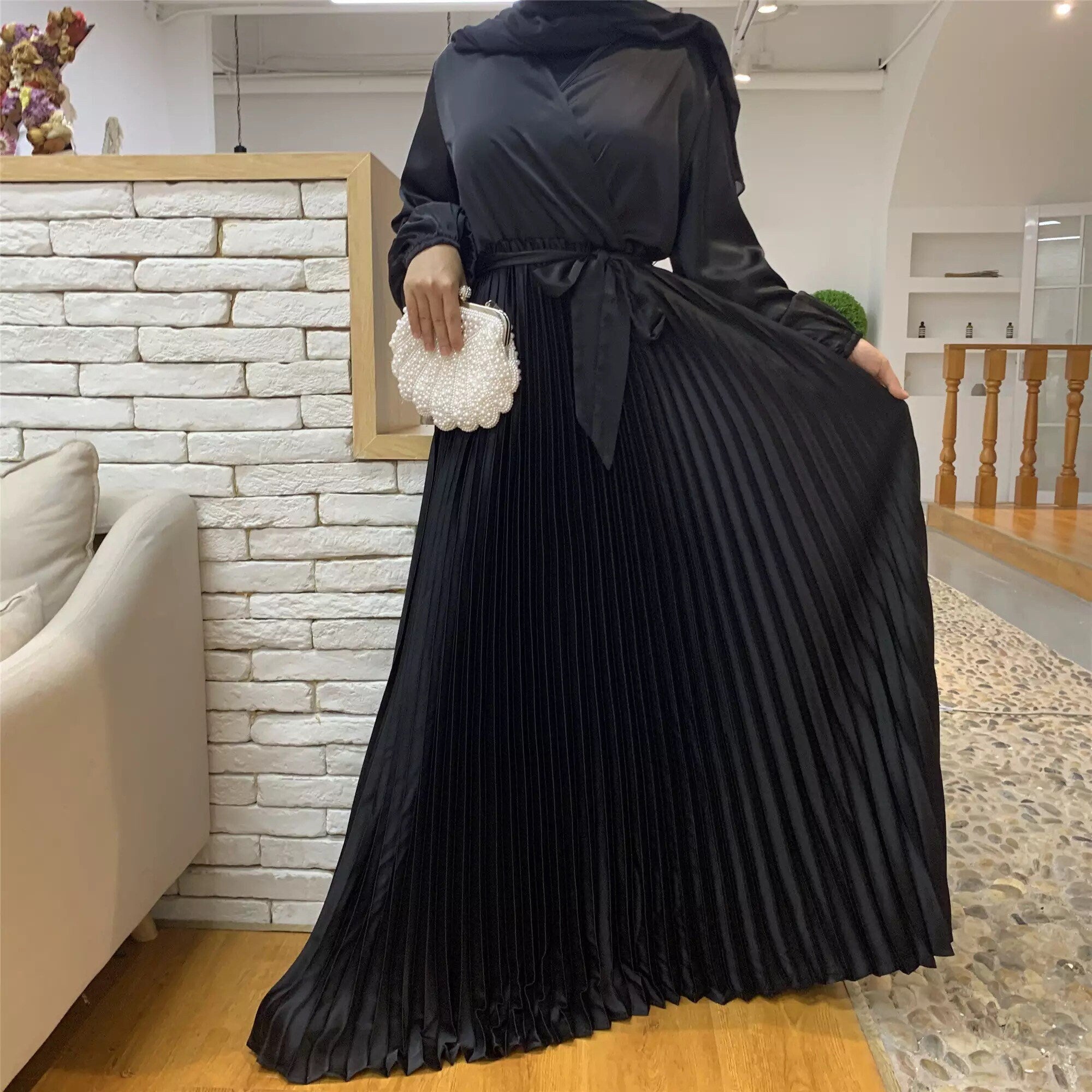 Pleated satin dress with belt