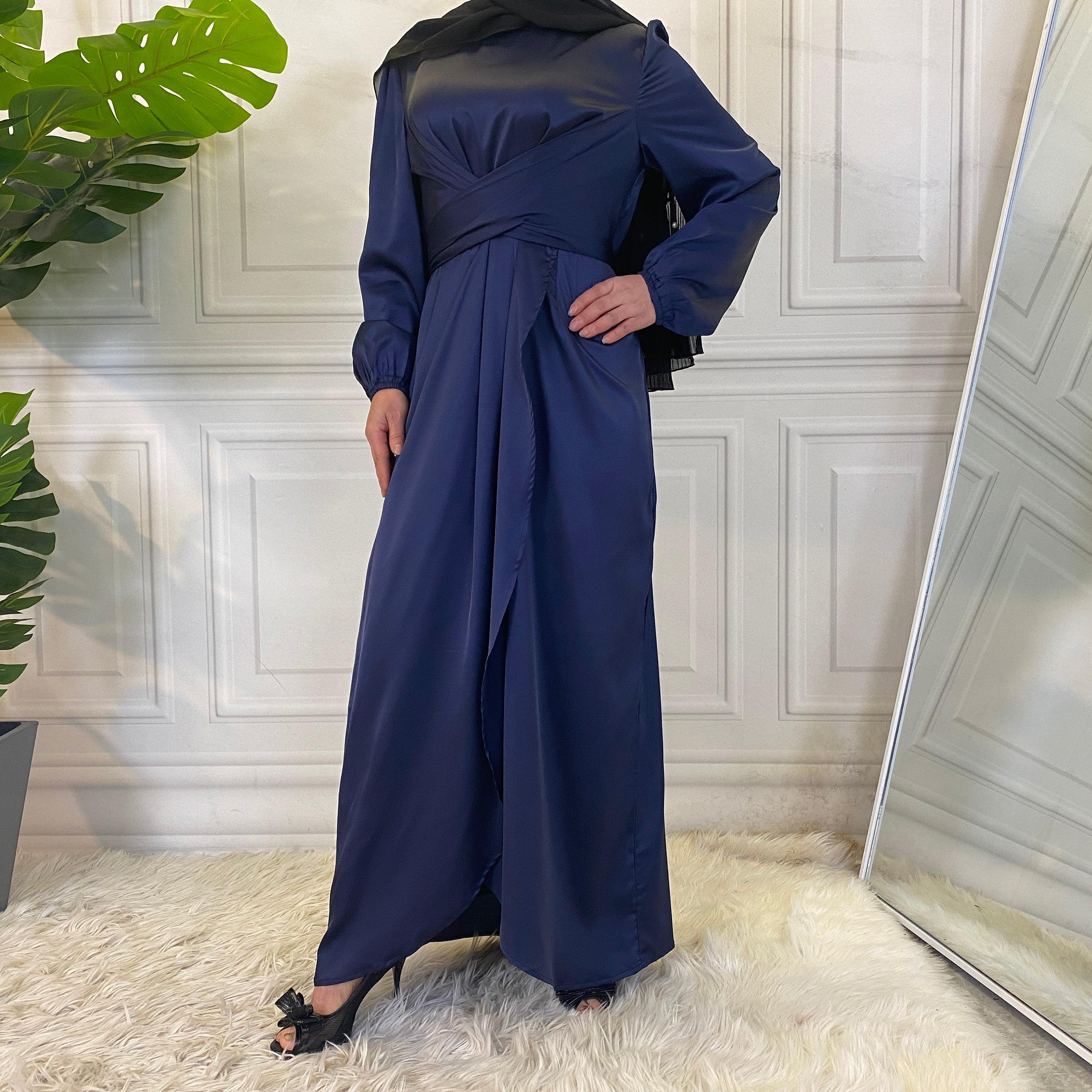 Long purple dress on a mannequin satin hijab dress