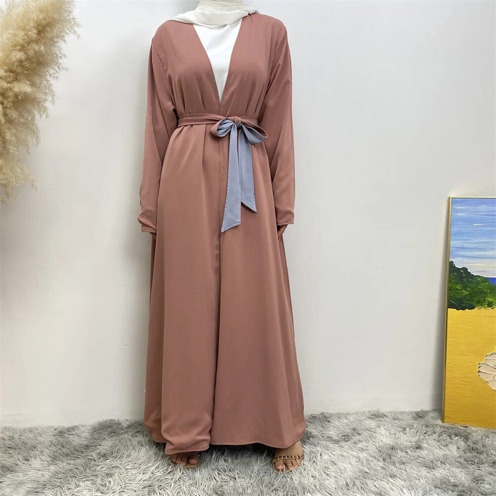 long dresses, one maroon and one brown, on a neutral background.