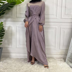 Long purple dress on a mannequin satin hijab dress
