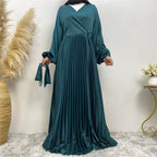 Pleated satin dress with belt